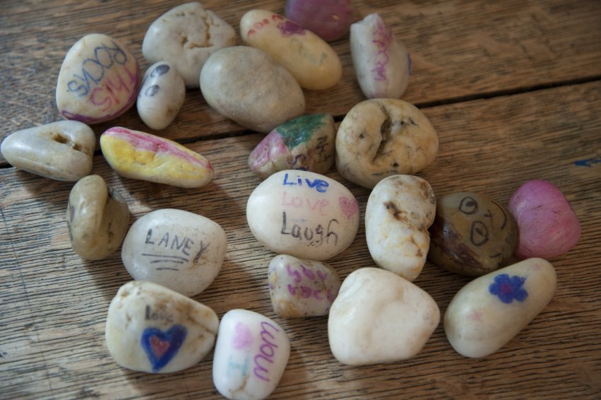 Painted memory stones created by program participants