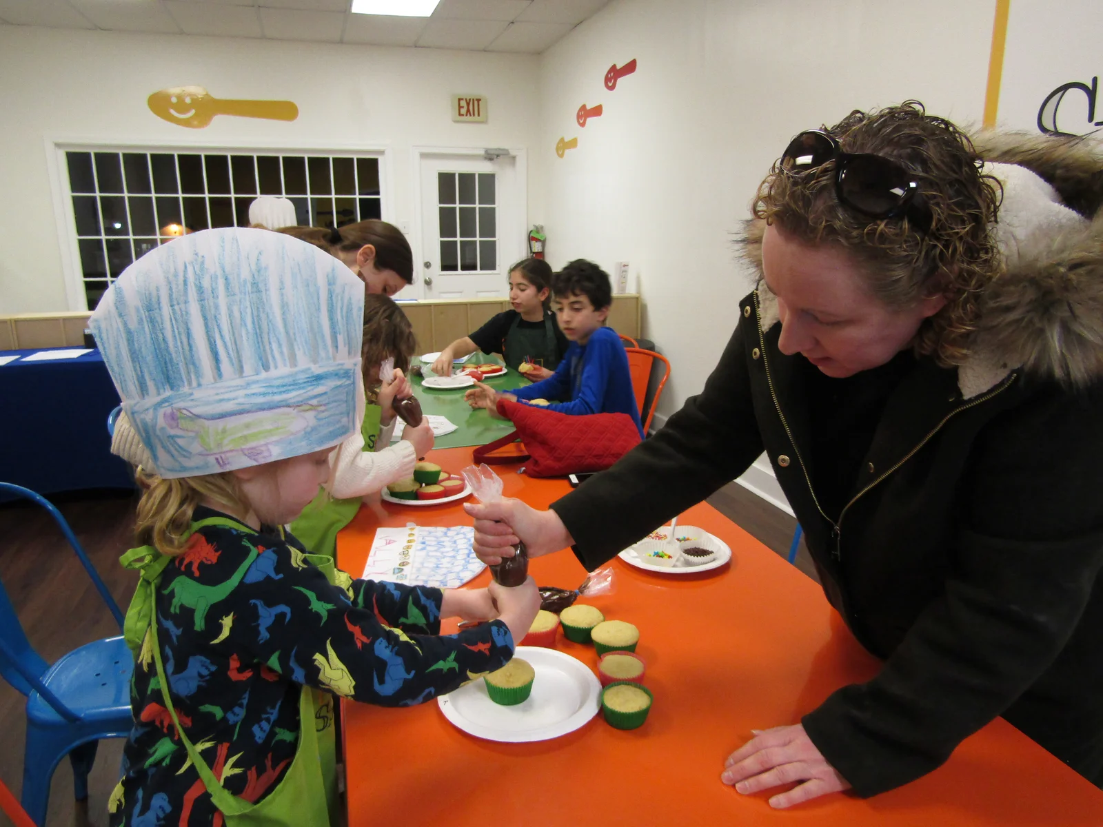 Children taking part in a hands-on cooking workshop